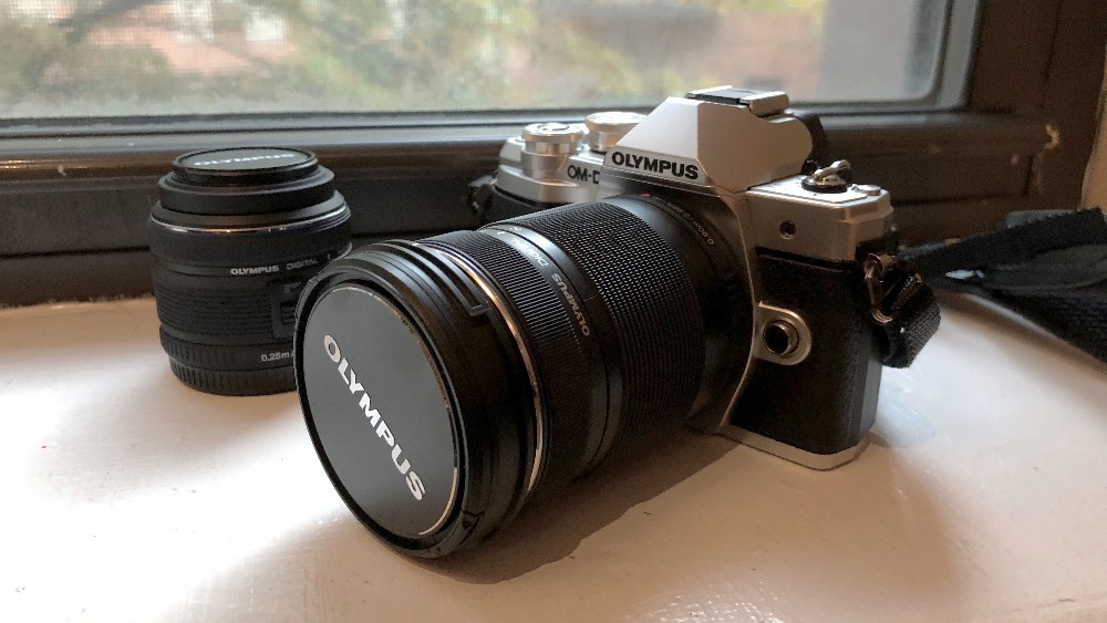 Olympus OM-D E-M10 camera with Olympus 40-150mm lens
